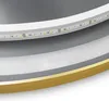 A close-up view of a decorative light fixture with LED lights and a gold trim. Voir les images du produit