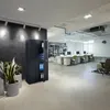 An office environment with desks, chairs, and a filing cabinet. Náhľad obrázku produktu