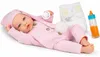 Puppe Lia im rosa Strampler mit Schnuller, Windel und Babyflasche auf weißem Hintergrund. Voir les images du produit
