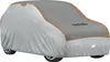 A car covered with a protective cover. Voir les images du produit