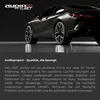 A dark, sleek sports car is shown from a low angle, with its rear quarter and wheels in focus. The background is dark and reflective. Produktbild-Vorschau