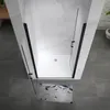 A modern bathroom with a black-framed glass shower enclosure. Produktbild-Vorschau