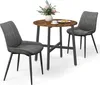 A round dining table with two chairs, set against a white background. Produktbild-Vorschau