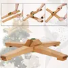 Collage showing assembly steps of a wooden Christmas tree stand and a close-up of the assembled stand. Voir les images du produit