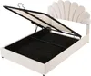 A cream-colored bed frame with its storage compartment open, revealing the slatted base and the black interior of the storage area. The headboard has a distinctive fan or shell-like design. Náhľad obrázku produktu
