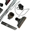 A collection of vacuum cleaner attachments arranged on a white background. Produktbild-Vorschau
