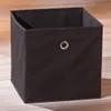 A black fabric storage box with a metal grommet on a wooden floor. Produktbild-Vorschau