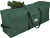 A green Christmas tree storage bag with a portion of a faux Christmas tree sticking out of the top. Voir les images du produit