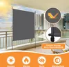 A balcony screen is set up on a balcony with a city skyline in the background. Produktbild-Vorschau