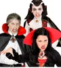 Three children dressed as vampires, posing for a photo. Produktbild-Vorschau