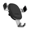 A black and silver gravity phone holder for a car's air vent. Voir les images du produit