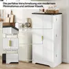 A white kitchen cabinet with a black top, featuring gold handles and fluted doors, is shown in a kitchen setting. Insets highlight specific features. Anteprima dell’immagine prodotto