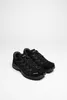 A pair of black LOWA hiking shoes on a white background. Produktbild-Vorschau