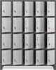 A grid of metal lockers, mostly closed with a few doors ajar. Náhľad obrázku produktu