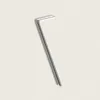 A silver-colored Allen wrench on a light beige background. Náhled obrázku produktu