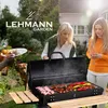 Two women are grilling food in a garden setting, with a dog nearby. Náhľad obrázku produktu