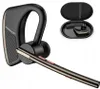 A black Bluetooth headset with gold accents is shown against a white background. A charging case containing another headset is visible in the upper right corner. Produktbild-Vorschau