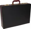 A black briefcase with brown trim and gold hardware. Voir les images du produit