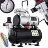 A close-up studio shot of an airbrush compressor with a 3L tank and accessories. Podgląd zdjęcia produktu