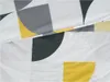 A close-up view of a fabric with a geometric pattern. Náhľad obrázku produktu