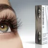 A close-up of a human eye and a product box for eyelash and eyebrow serum. Podgląd zdjęcia produktu