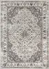A top-down view of a rectangular rug with a distressed Persian-inspired pattern. Voir les images du produit