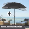 A patio umbrella is shown tilted and at a certain height, with two chairs and a small table on a wooden deck overlooking the ocean. Produktbild-Vorschau
