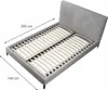 A grey upholstered bed frame with a slatted base, shown from a diagonal top-down perspective. Dimensions are indicated with arrows and text. Produktbild-Vorschau