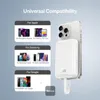 A white power bank is attached to the back of a silver smartphone, with compatibility information for Apple, Samsung, and Google devices displayed on the left. Produktbild-Vorschau