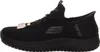 Side view of a black Skechers slip-on shoe. Voir les images du produit
