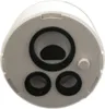 A close-up, top-down view of a white plumbing cartridge with black rubber seals and mesh. Anteprima dell’immagine prodotto