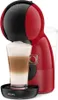 A red and black Krups Dolce Gusto coffee machine with a glass of latte macchiato. Anteprima dell’immagine prodotto