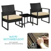 A set of outdoor furniture, including two chairs and a small table, with a close-up of hands weaving rattan. Podgląd zdjęcia produktu