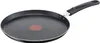 A black crepe pan with a red heat indicator in the center and a black handle, set against a white background. Voir les images du produit