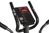 Close-up of a tablet mounted on an elliptical machine's console, displaying a music or podcast app. Produktbild-Vorschau