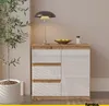 A modern sideboard with drawers and a door, placed in a room setting with a plant and a lamp. Voir les images du produit
