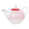 A white teapot with red polka dots and hearts. Anteprima dell’immagine prodotto