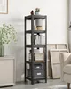 A black metal shelving unit with wooden shelves is shown in a room with a white brick wall and a sofa in the background. Produktbild-Vorschau