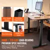 A collage of images showcasing features of a standing desk frame, with a main image of the desk in use in an office setting. Podgląd zdjęcia produktu