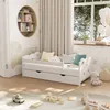 A child's bedroom with a white bed, toys, and decorations. Anteprima dell’immagine prodotto