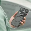 A hand holding a phone case with a magnetic ring. Produktbild-Vorschau