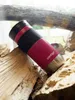 A Contigo travel mug is placed on a pile of logs, with a blurred background of greenery and a window. Anteprima dell’immagine prodotto