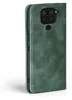A green flip case for a Xiaomi Redmi Note 9 phone, shown from the side and slightly angled. Produktbild-Vorschau