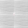 A white, wavy textured wall panel. Náhľad obrázku produktu