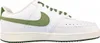 A white Nike Court Vision Low sneaker with green accents is shown against a white background. Produktbild-Vorschau
