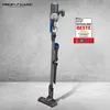 A cordless vacuum cleaner is displayed against a textured gray wall and a concrete floor. Náhled obrázku produktu
