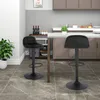 Two black bar stools in a modern kitchen setting. Produktbild-Vorschau