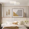 A bedroom scene with a bed, nightstands, and wall decor, featuring a ceiling light. Anteprima dell’immagine prodotto