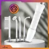 A set of four interchangeable electrodes for a facial treatment device, displayed on a white pedestal against a light gray background. Produktbild-Vorschau