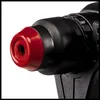 A close-up view of the chuck and front end of a black rotary hammer with a red protective cap. Náhled obrázku produktu